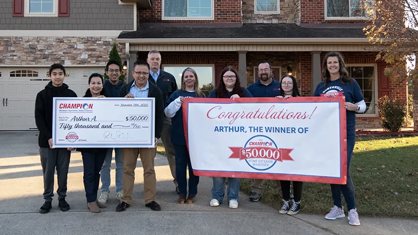 Champion contest winners with check