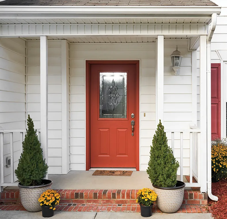 Exterior view: house with a red door