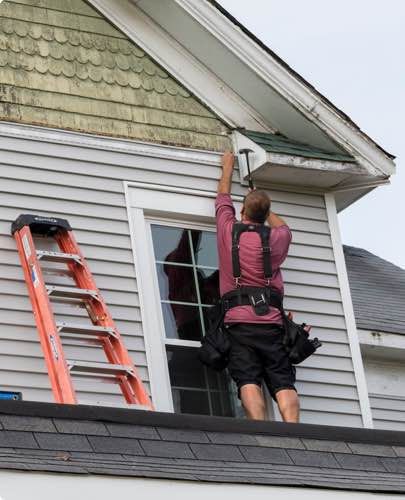Champion installer working on home