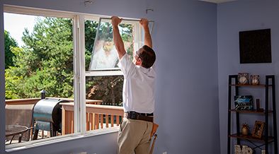 Champion installer removing old window frame
