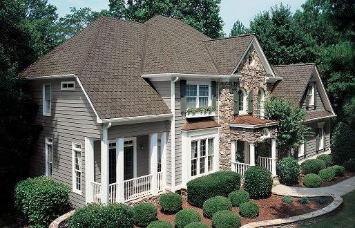 Home with asphalt shingle roofing
