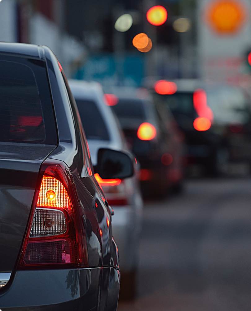 Cars driving on a busy street